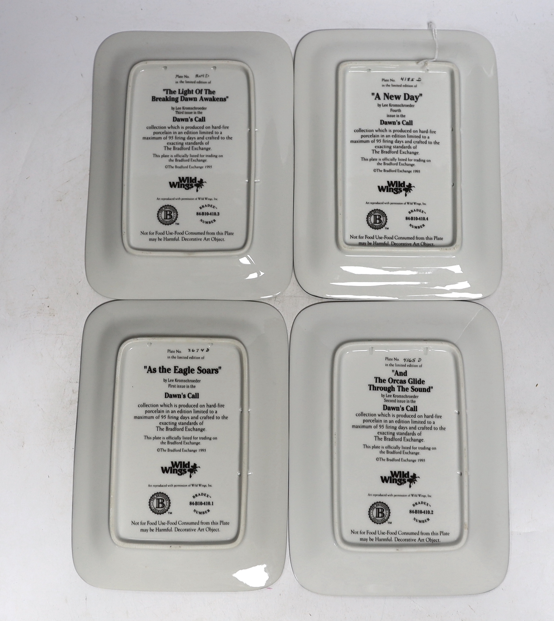 A set of four Bradex rectangular “Wild Wings” plates, 22cm high